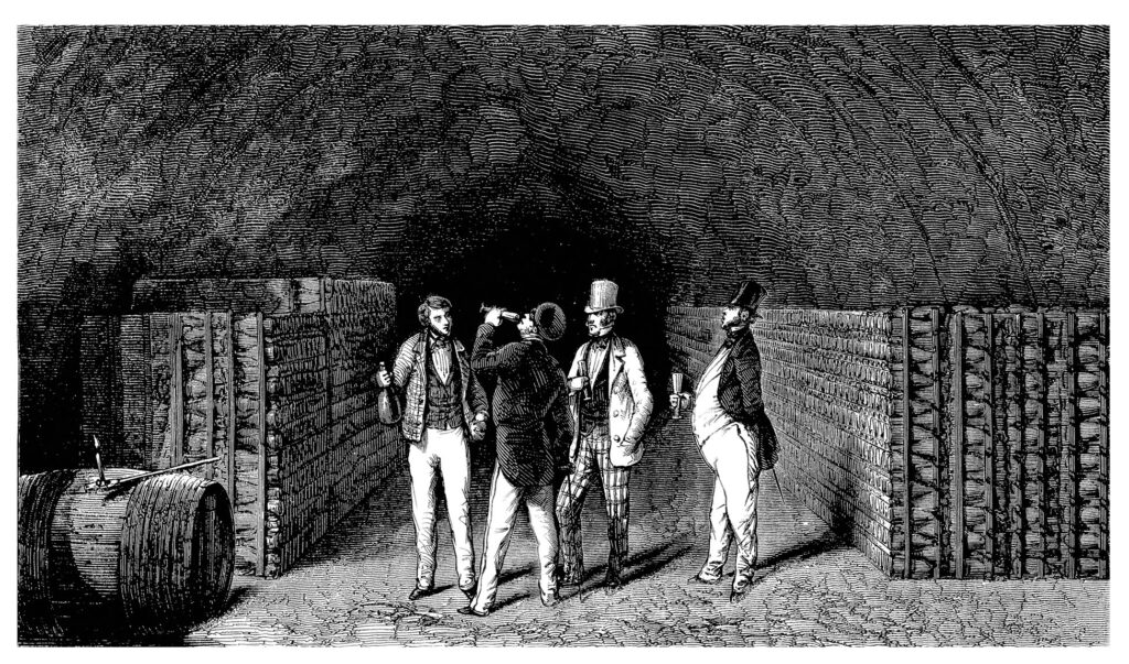 Four miners walk inside a dark underground tunnel with lanterns.